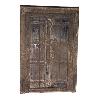 Old wooden door with frame