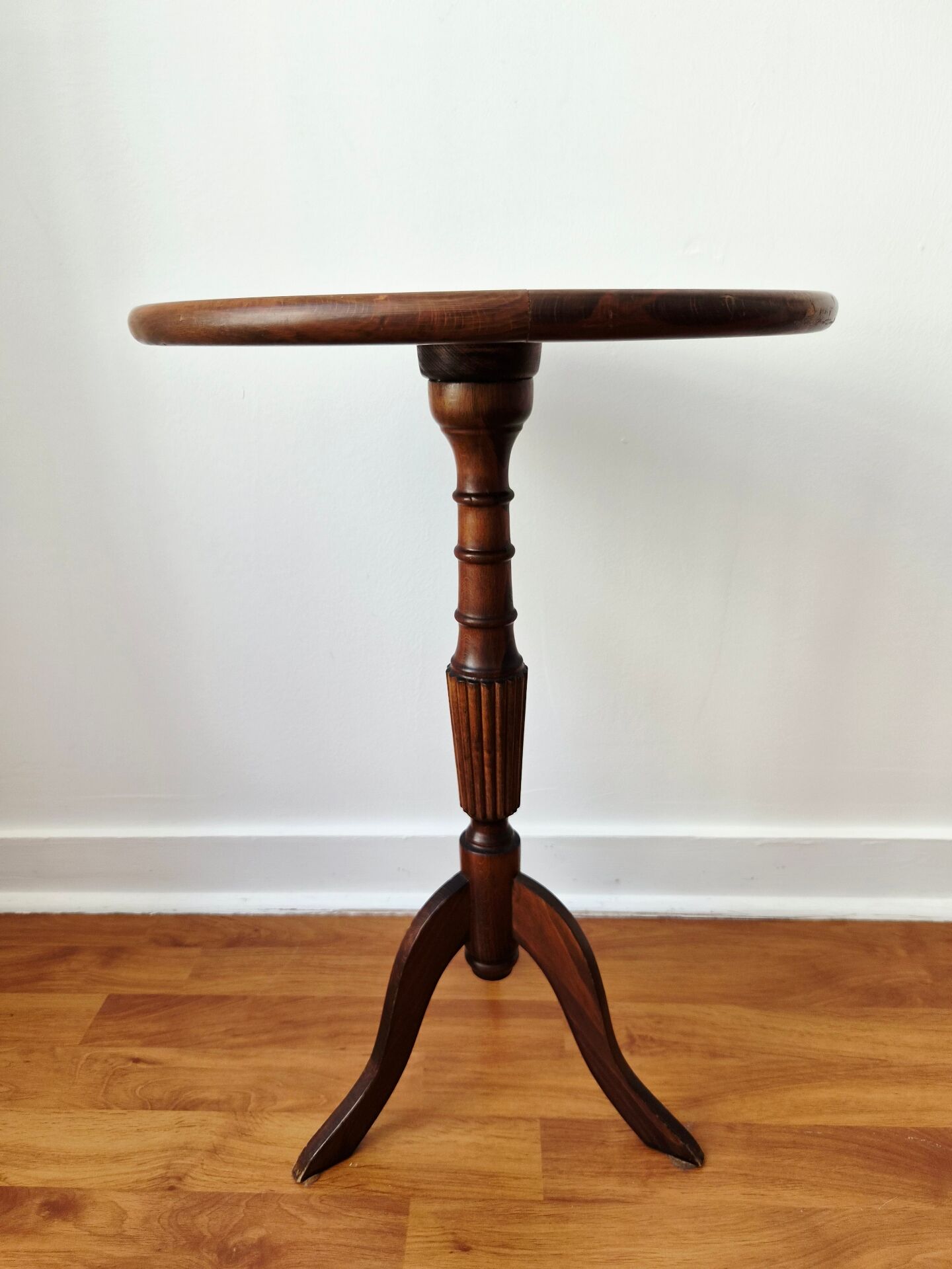 Small tripod wooden table with a vintage round top -