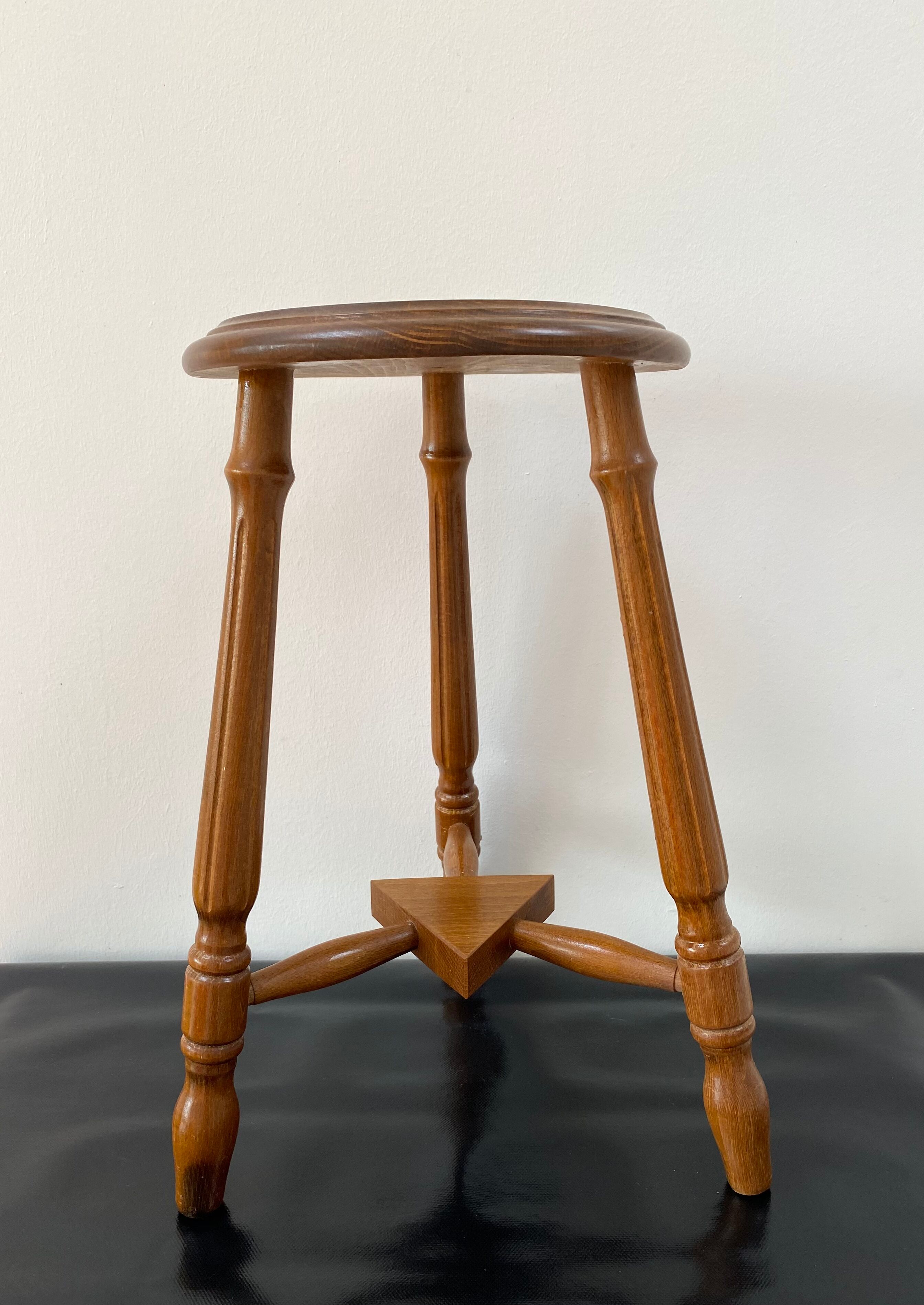 Vintage wooden tripod stool