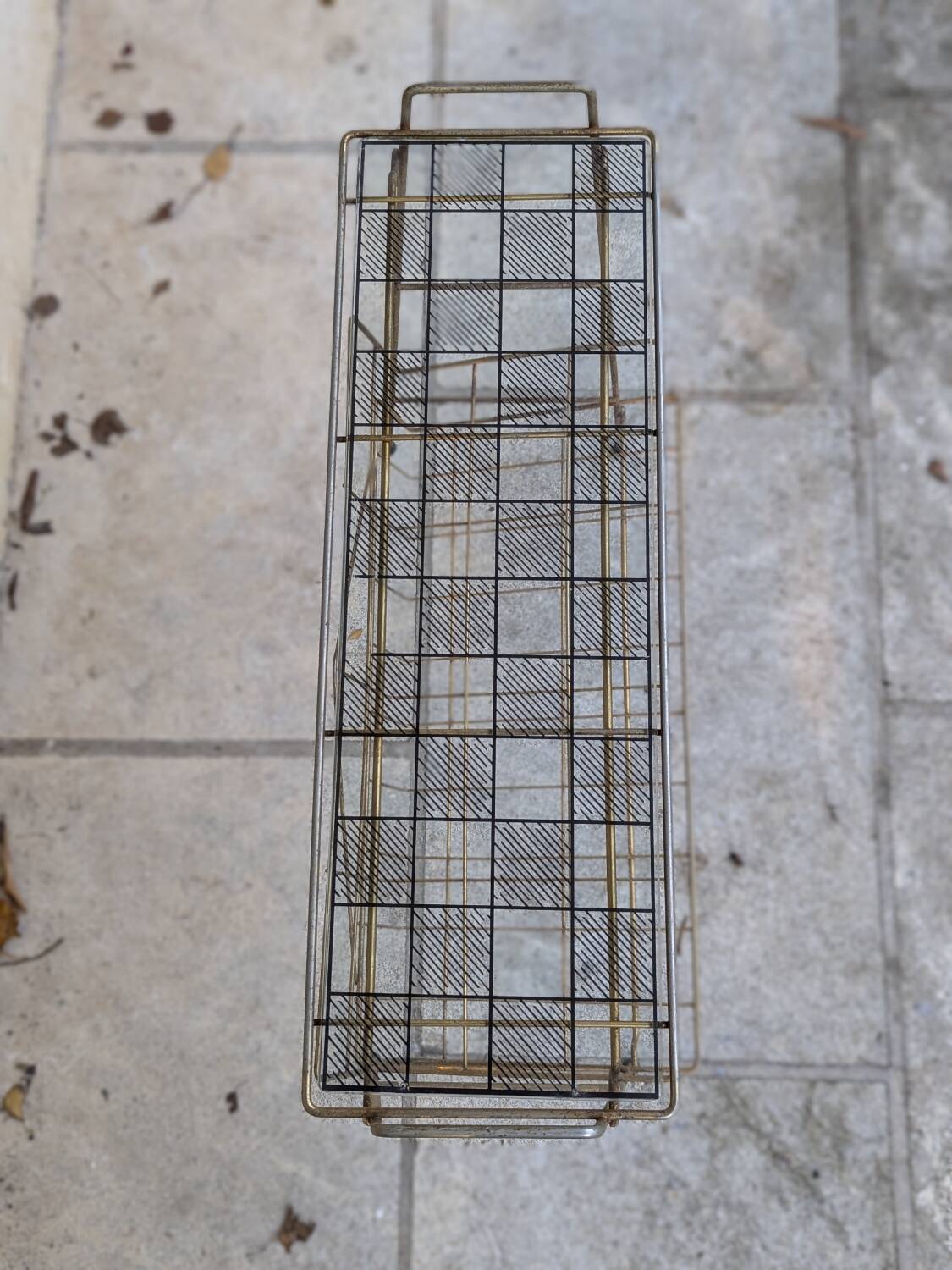 Gold metal magazine rack