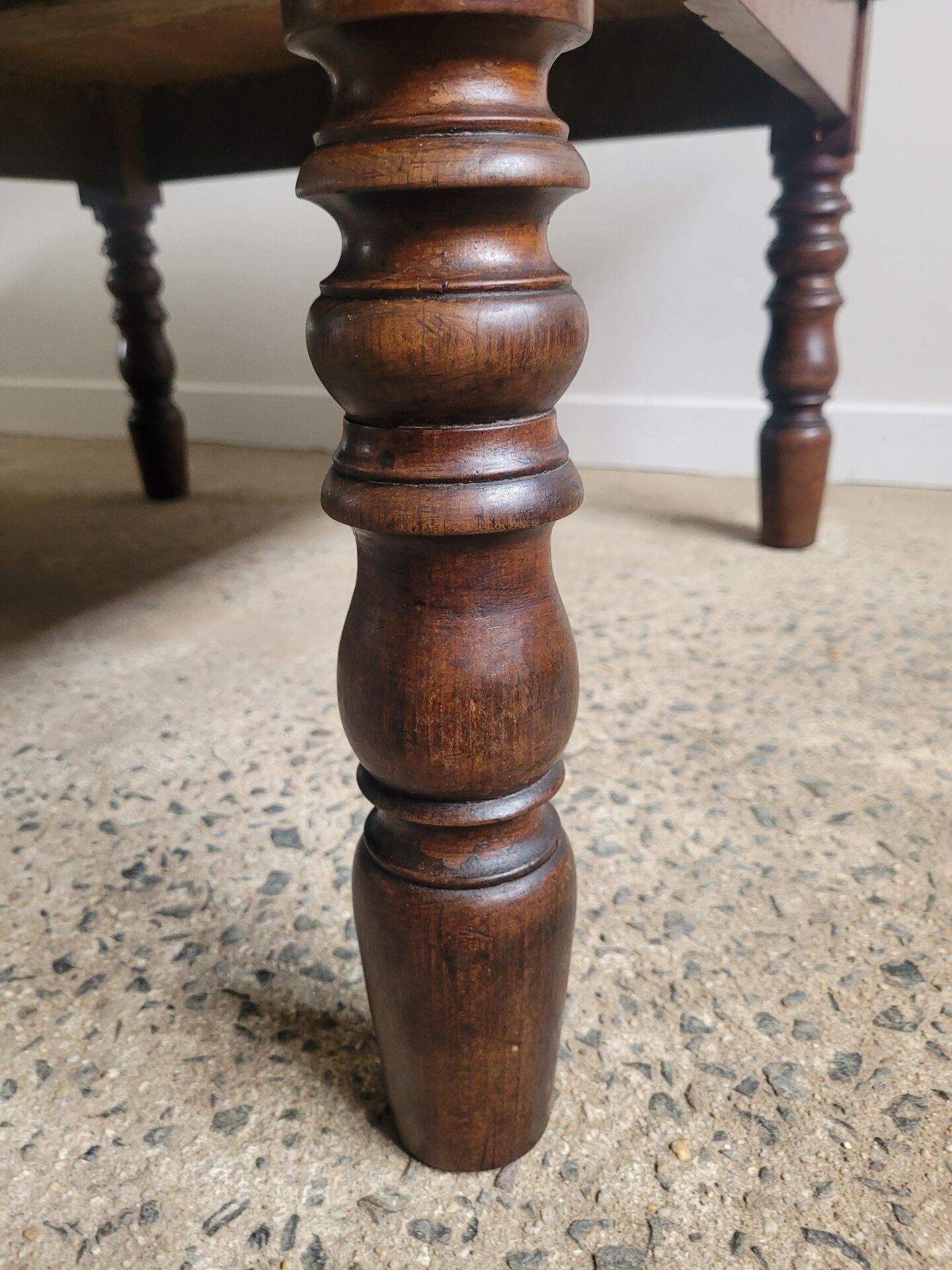 Wooden coffee table with turned legs