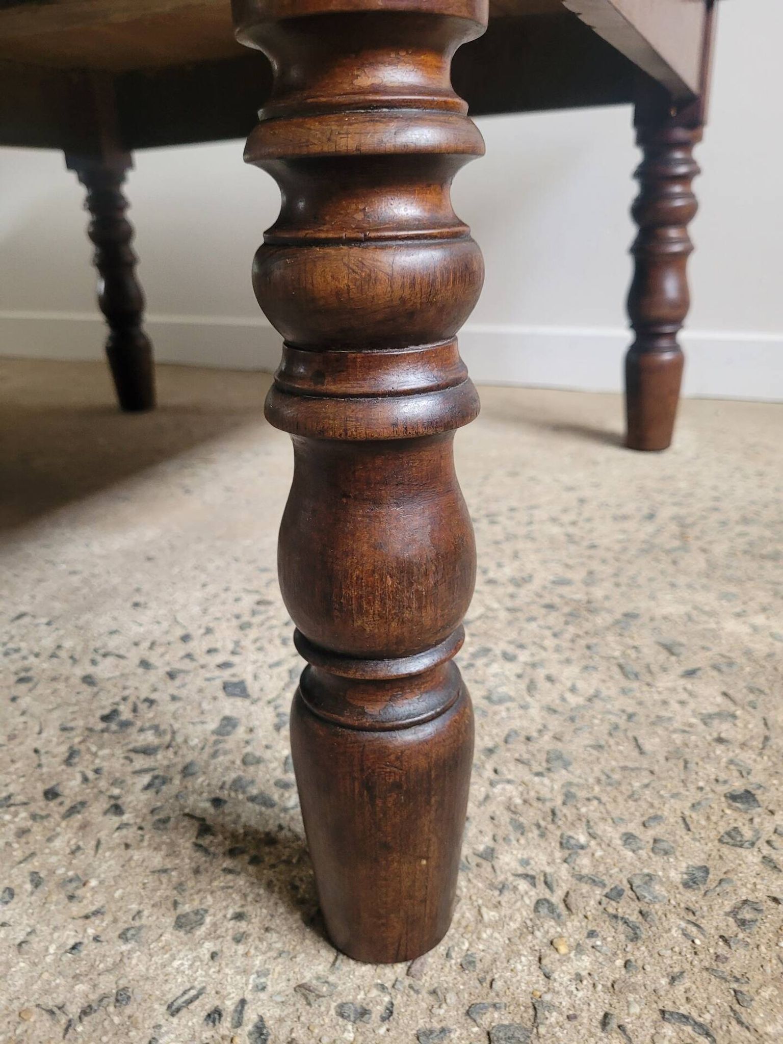 Wooden coffee table with turned legs