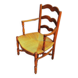 Old straw armchair