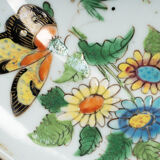 Porcelain plate of Canton XIXth decoration of butterflies and bird