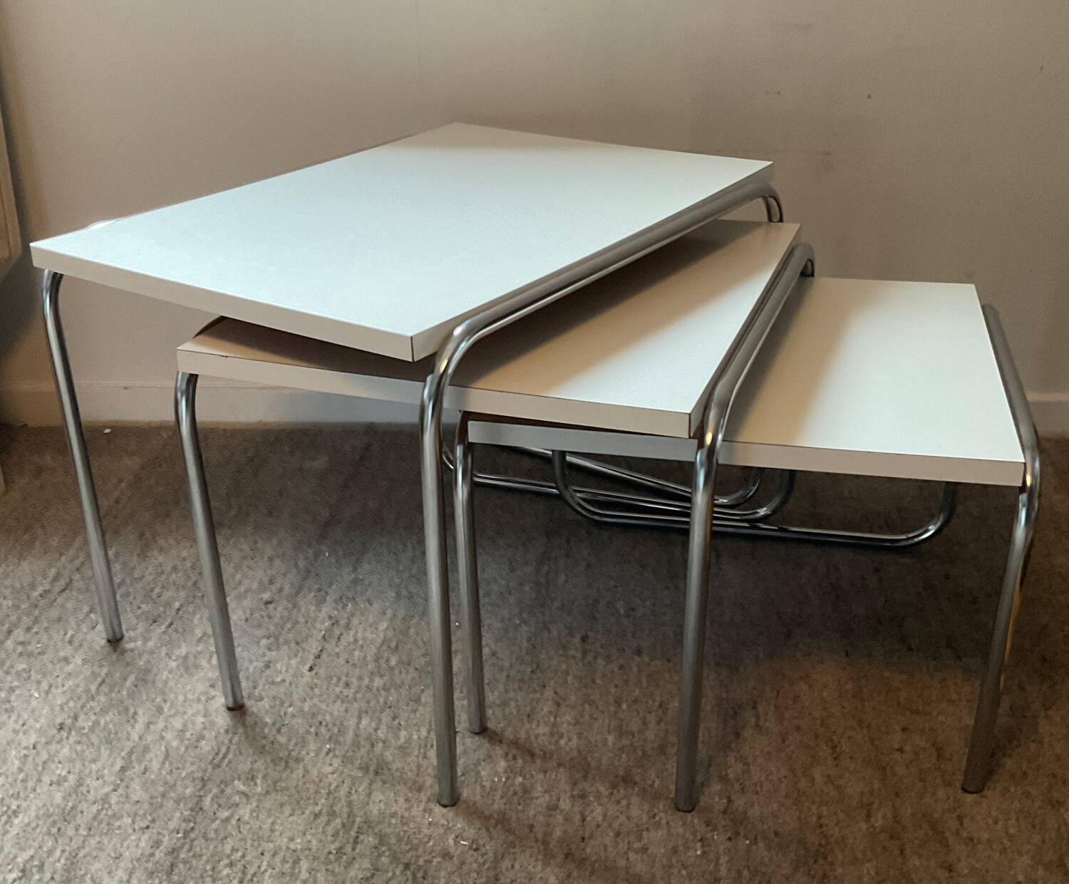 Trio of vintage nesting tables in Formica and chrome metal