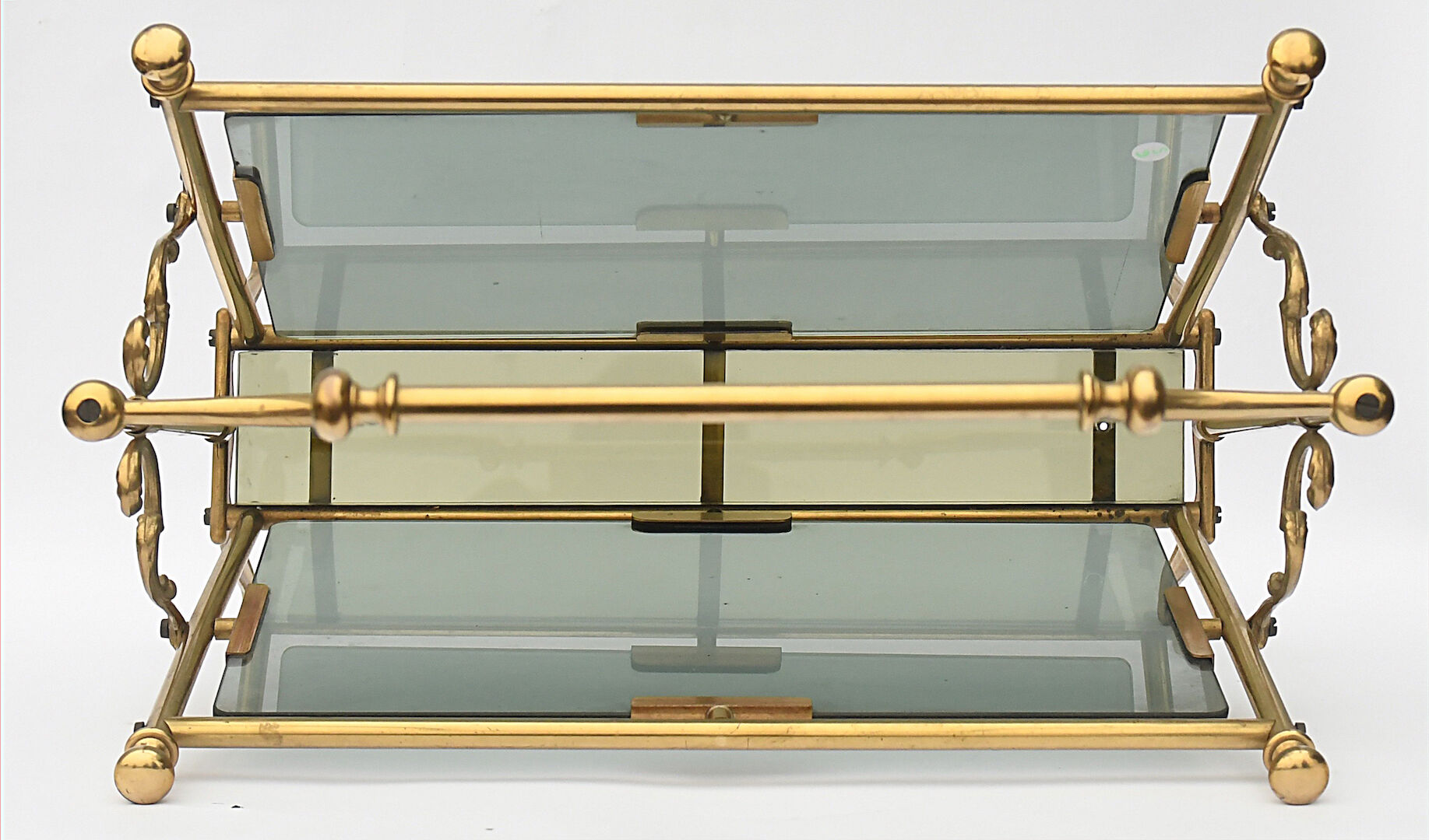 Brass and glass magazine holders