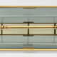 Brass and glass magazine holders