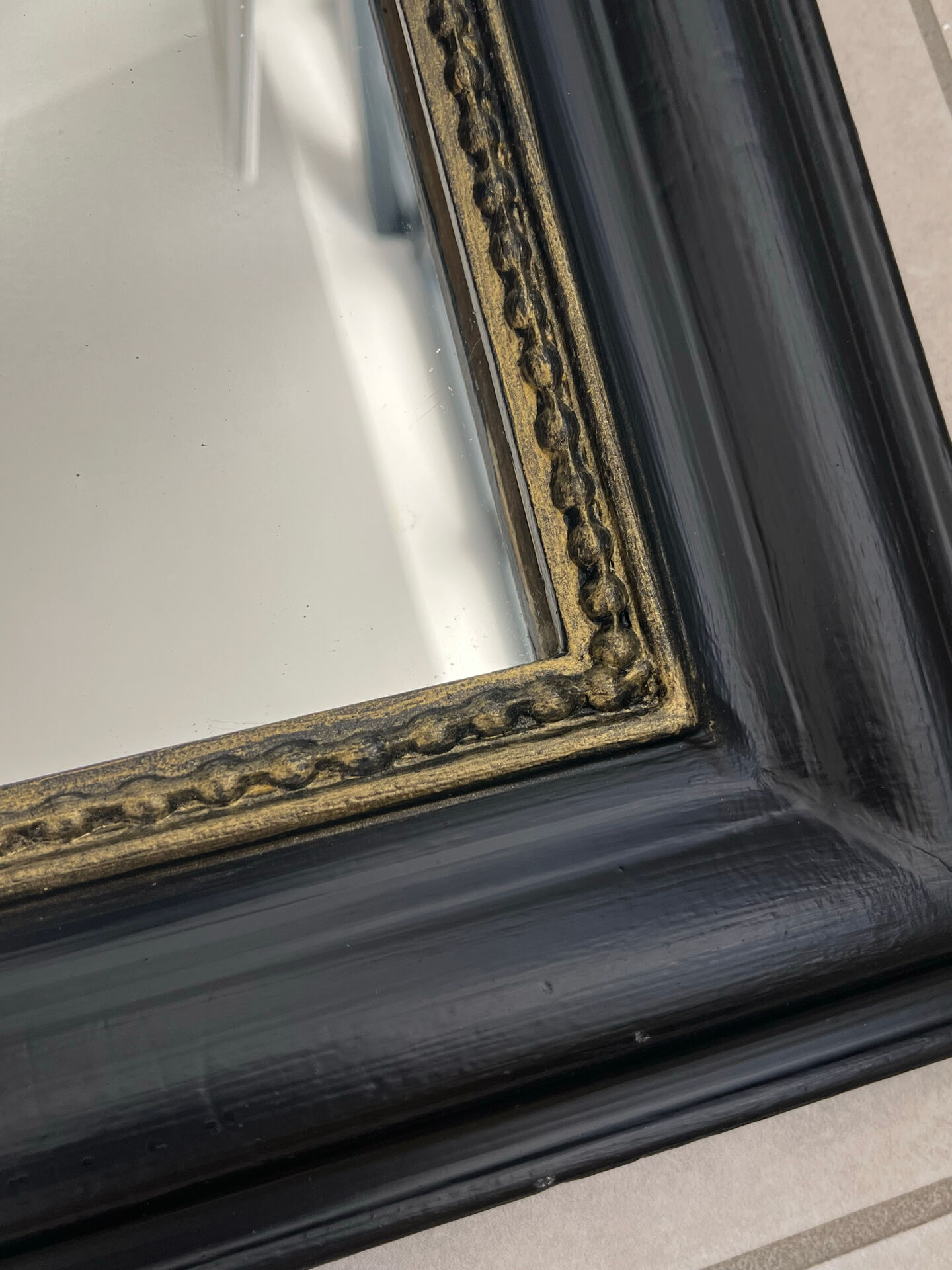 Louis Philippe mirror in black and gold