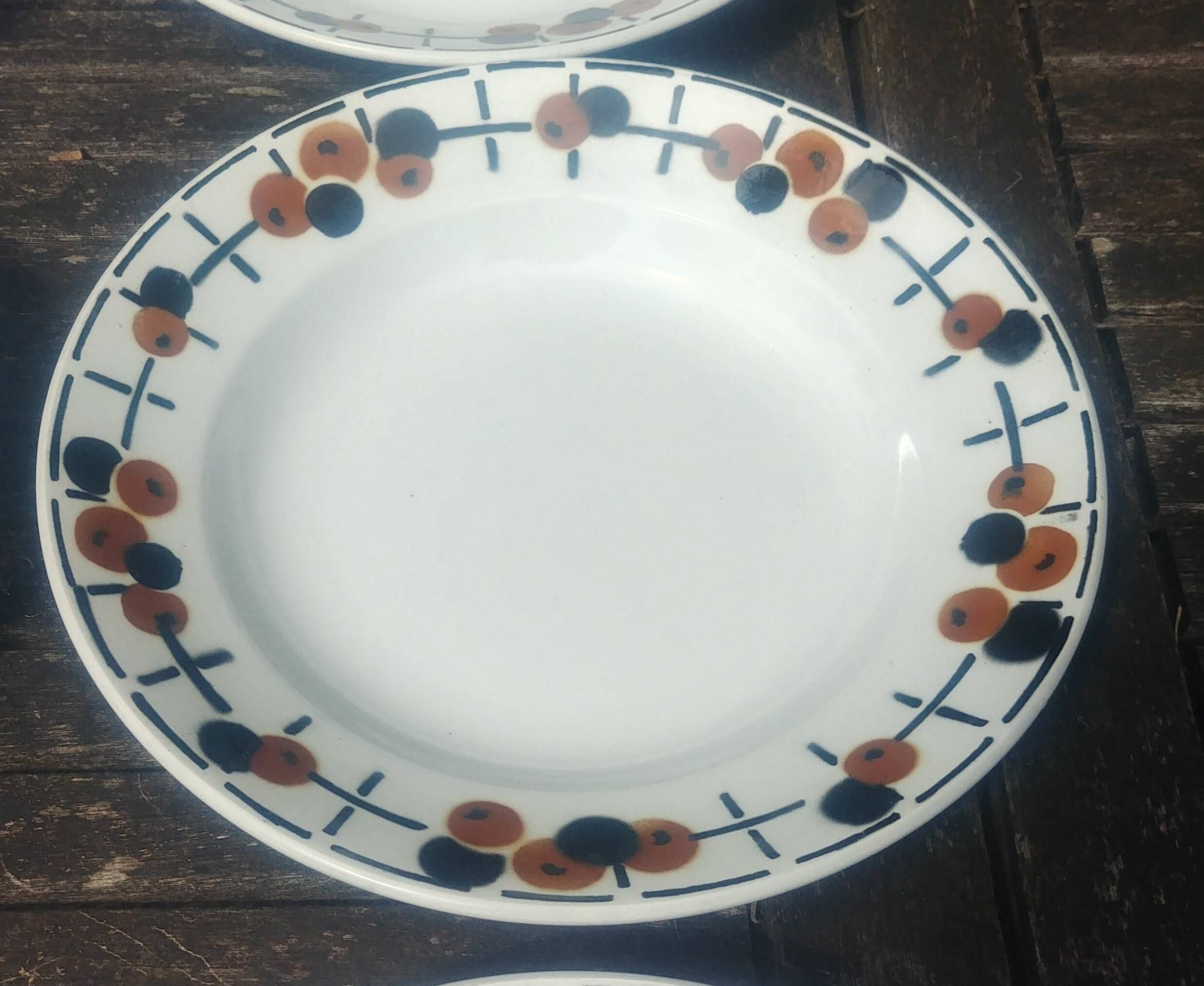 Set of eight ironstone soup plates from the Saint Amand earthenware factory