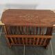 Rosewood and brass magazine stand table