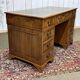 English flat desk with drawers from the 1970s in fir and leather top.