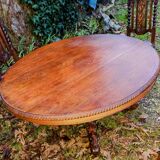 table de chasse ovale  1850  avec pieds central avec animaux scluptés
