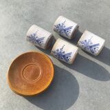 4 ceramic cups and saucers