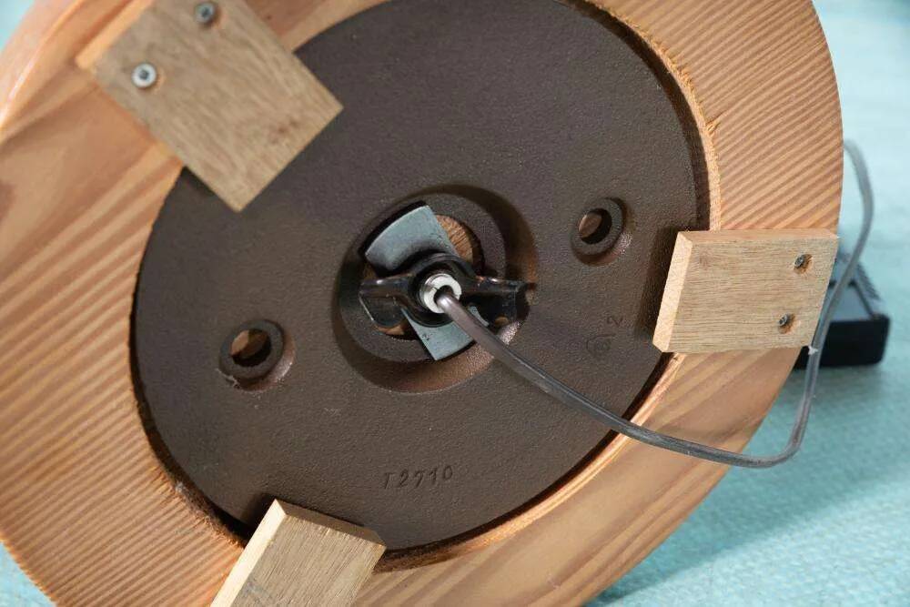 Vintage Swedish wooden floor lamp with pleated shade from the 1960s.