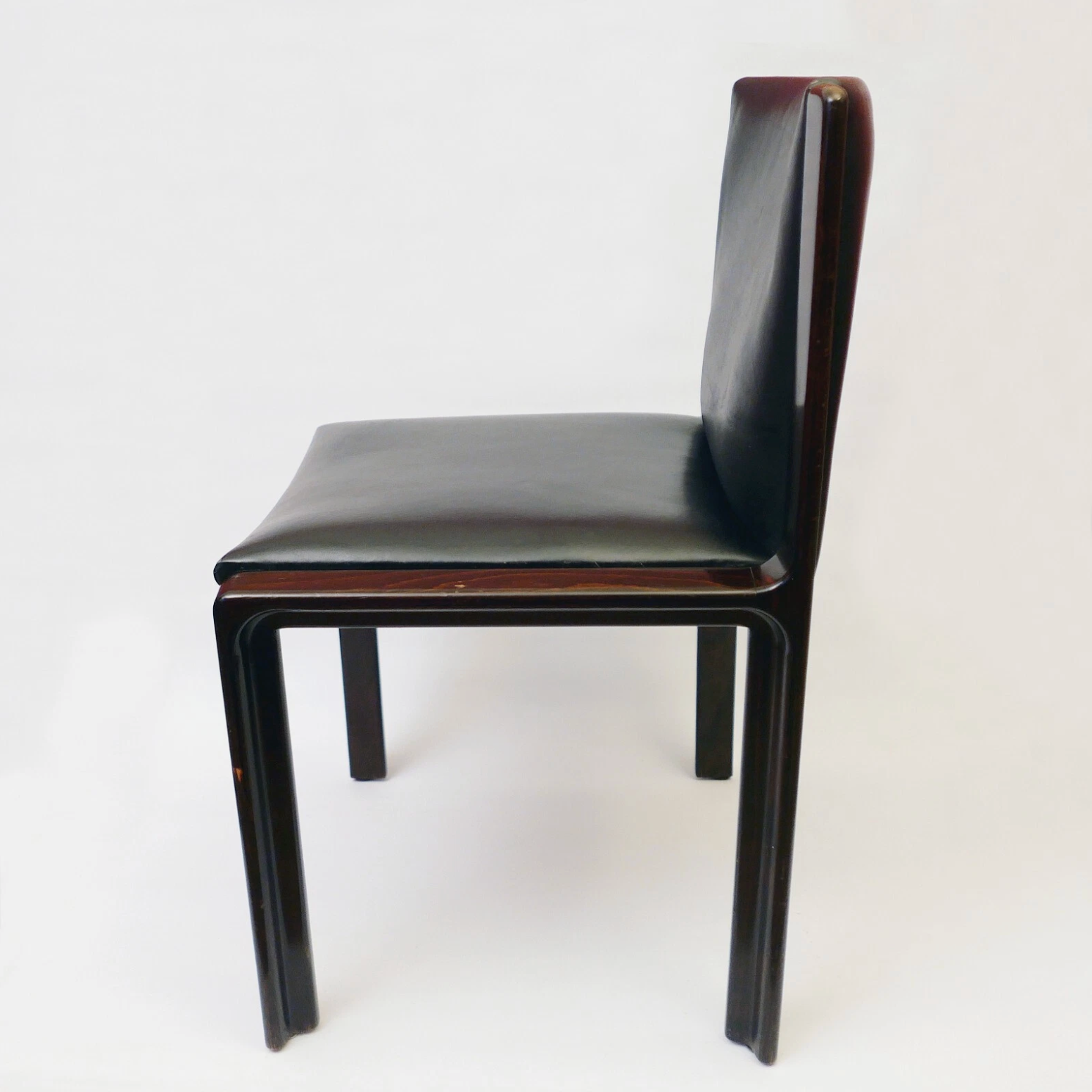 Chaise design scandinave  1960 en palissandre et cuir vintage des années 70