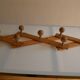 Brutalist wooden accordion wall coat rack with 7 hooks