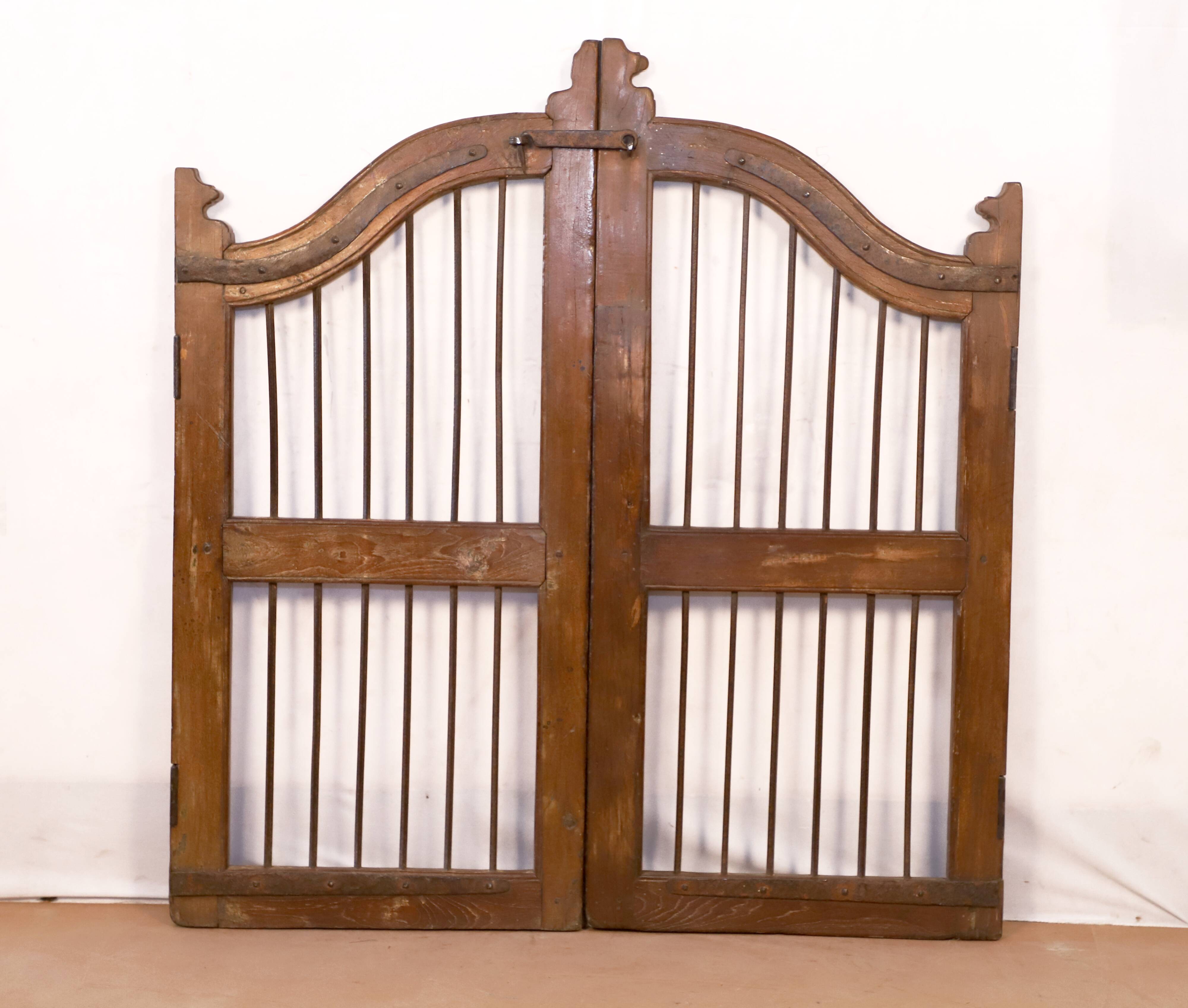Old Burmese teak gate with openwork wrought iron panels