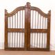 Old Burmese teak gate with openwork wrought iron panels