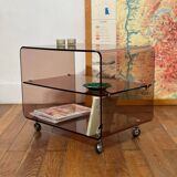 Smoked Plexiglas coffee table on wheels -