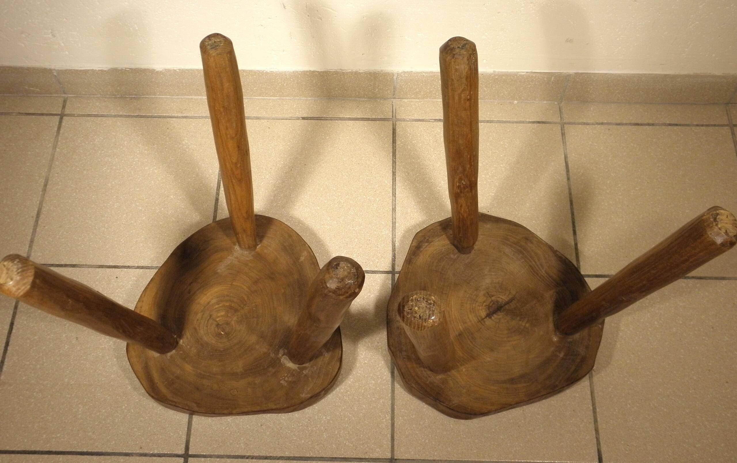 Pair of wooden tripod stools