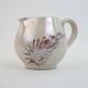 Pair of ceramic milk jugs signed La Roue Vallauris