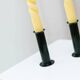 Set of 2 glossy black metal candleholders in retro Ikea Memphis style