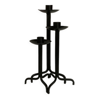 Trio of black metal tripod candle holders