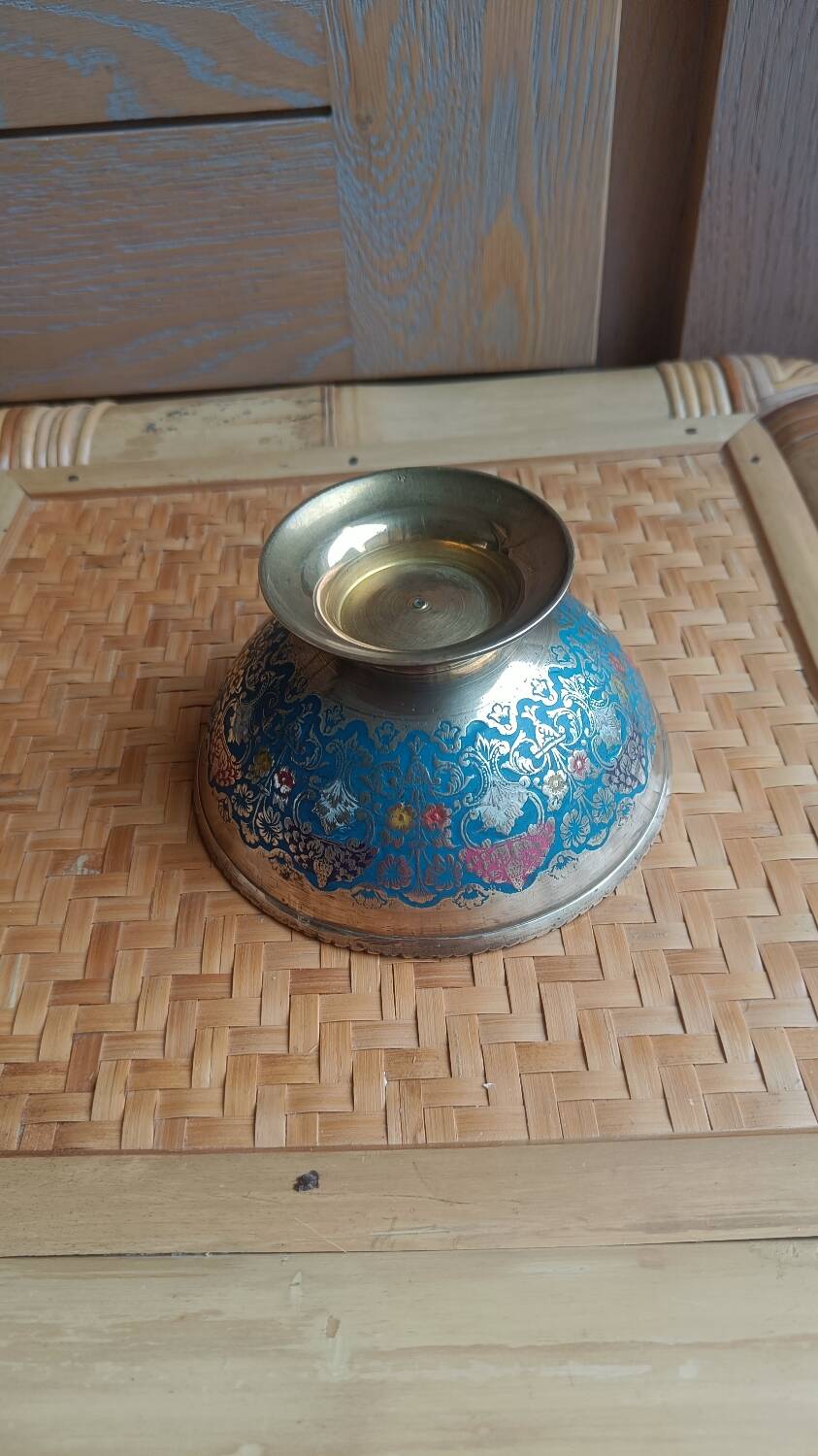 Brass footed bowl with coloured patterns