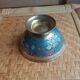 Brass footed bowl with coloured patterns