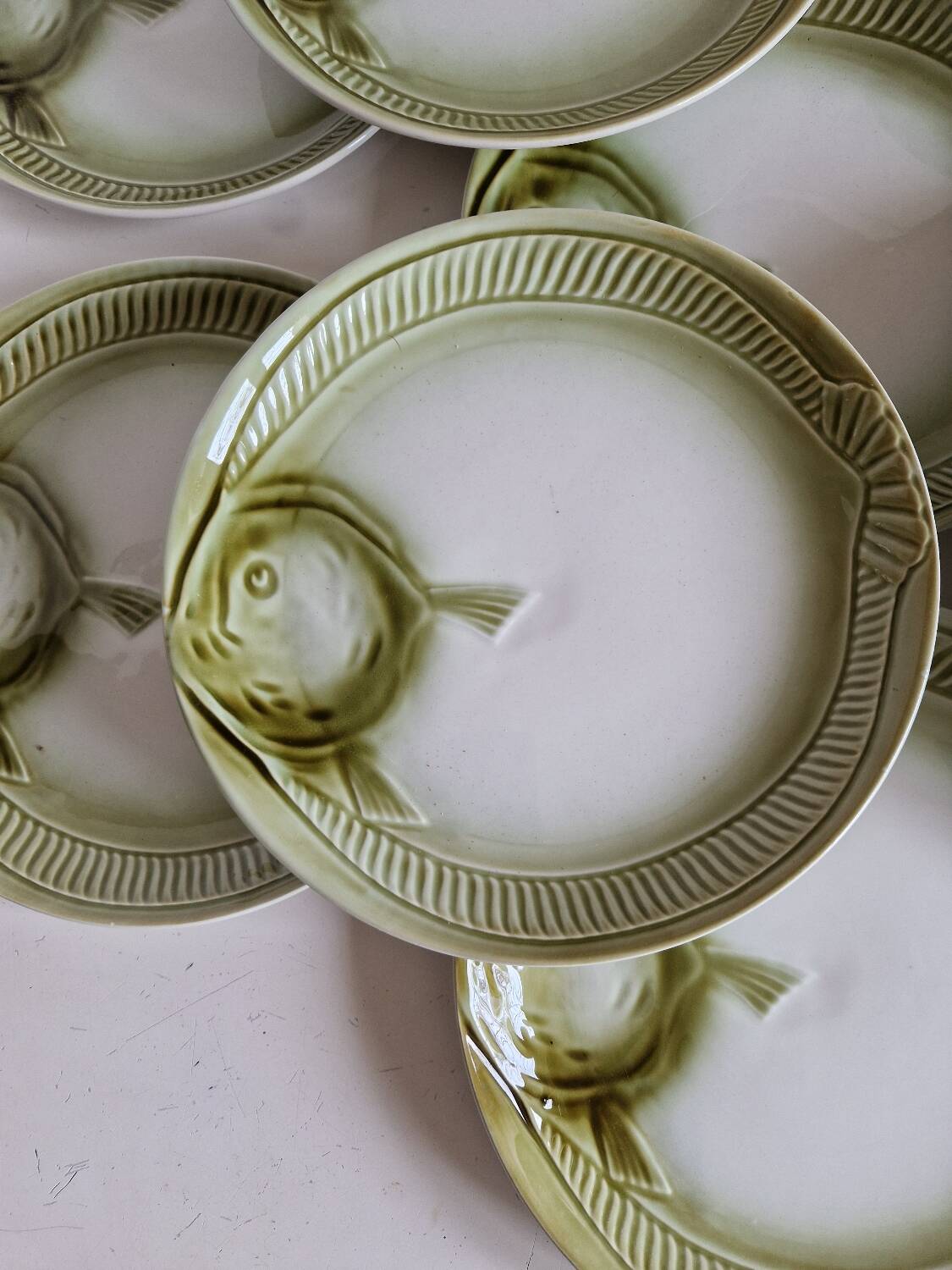 Set of 12 fish plates from the Moulin des Loups factory in Orchies