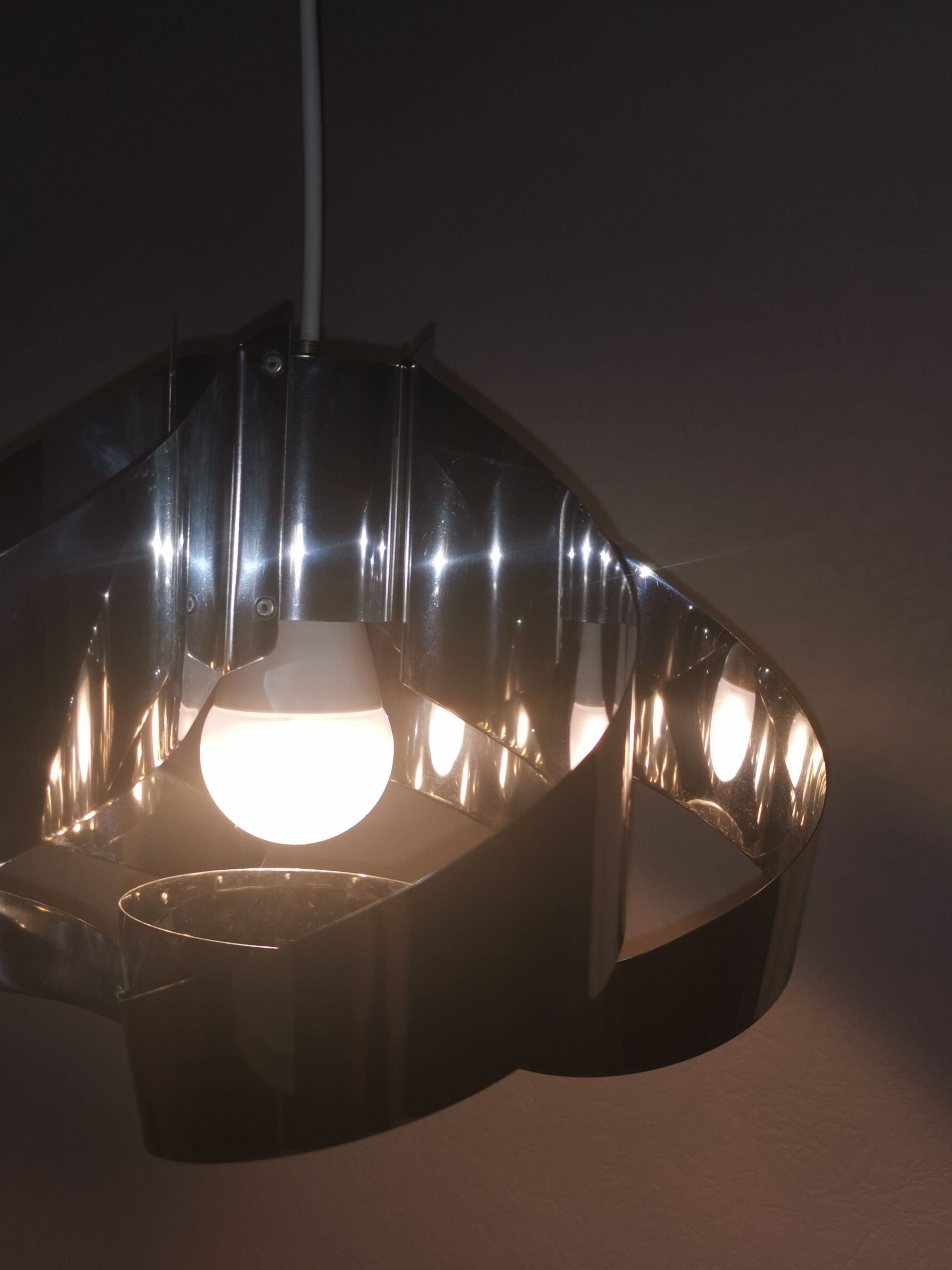 Curved stainless steel hanging lamp, Space Age, 1970