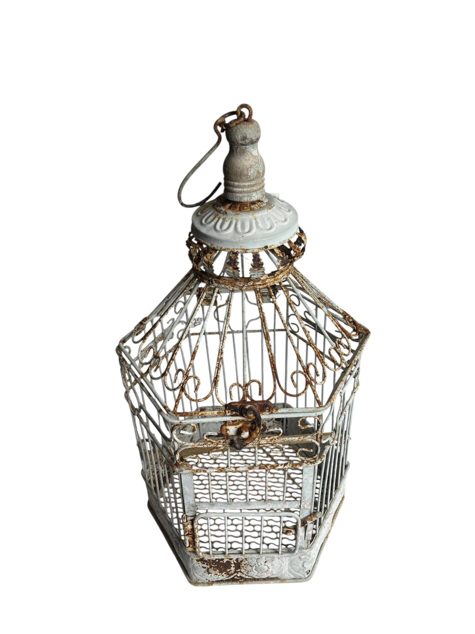 Vintage hexagonal metal birdcage from around 1940.