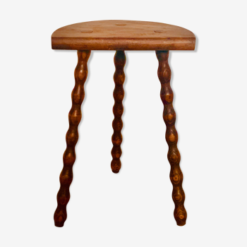 Artisanal tripod stool with turned legs