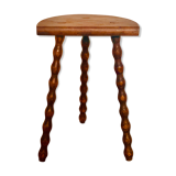 Artisanal tripod stool with turned legs