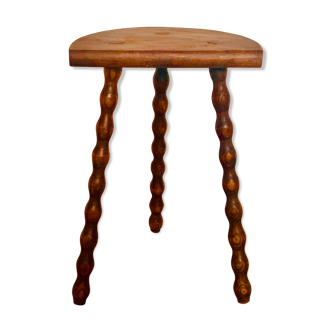 Artisanal tripod stool with turned legs