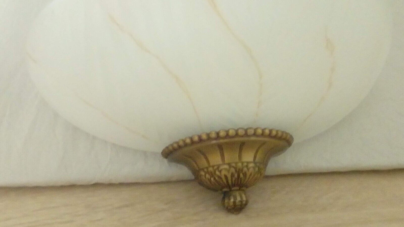 Pair of wall sconces in glass paste and brass
