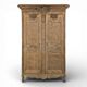 Armoire normande décapée richement sculptée