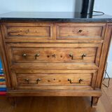Antique wooden order with black marble top