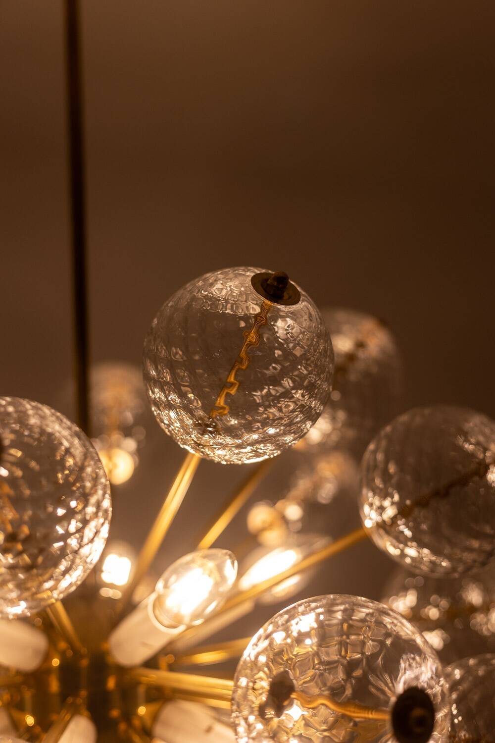 Kamenický Šenov, published by. Brass and glass chandelier. Around 1970.