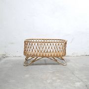 Vintage rattan cradle