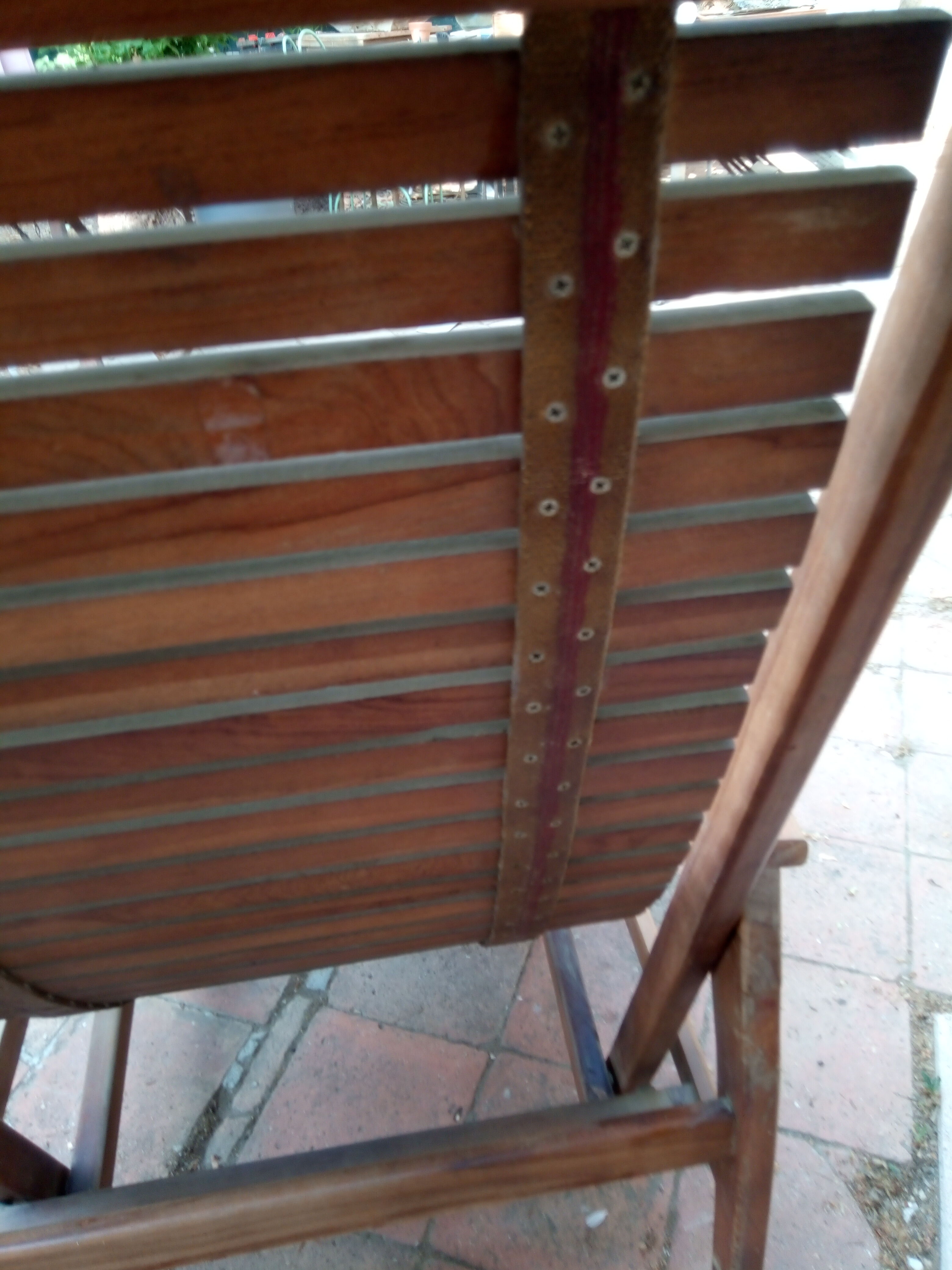 Teak stretchy long chair.