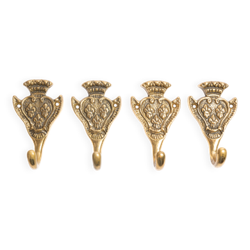 Set of four decorative vintage gold wall hooks, Europe, 1960s.