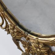 Miroir ovale en métal doré de style rococo, Italie, 20e siècle