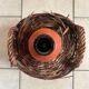 Old glass demijohn with wicker basket.