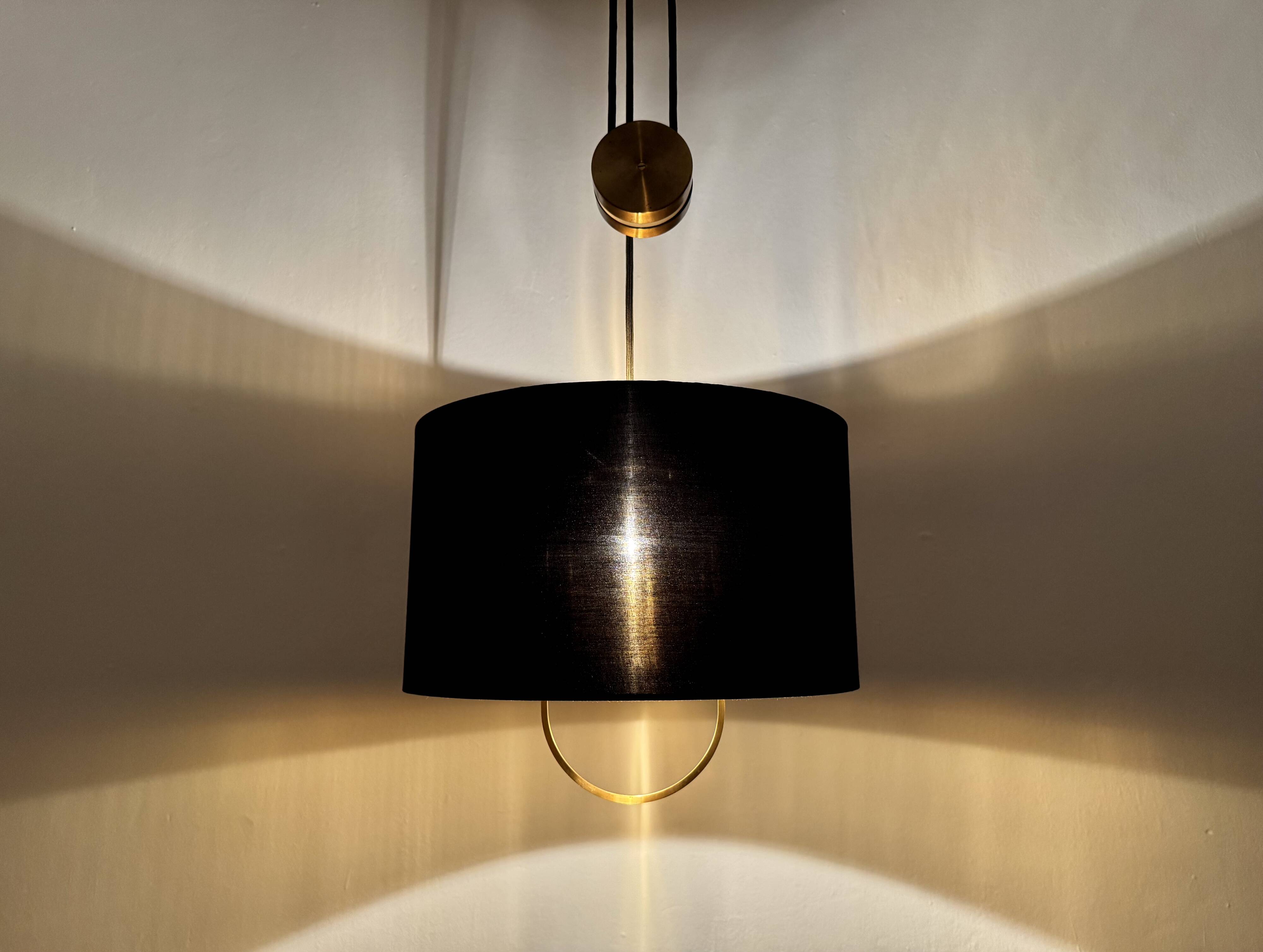 Lampe à pendentif Jo-Jo réglable par Florian Schulz