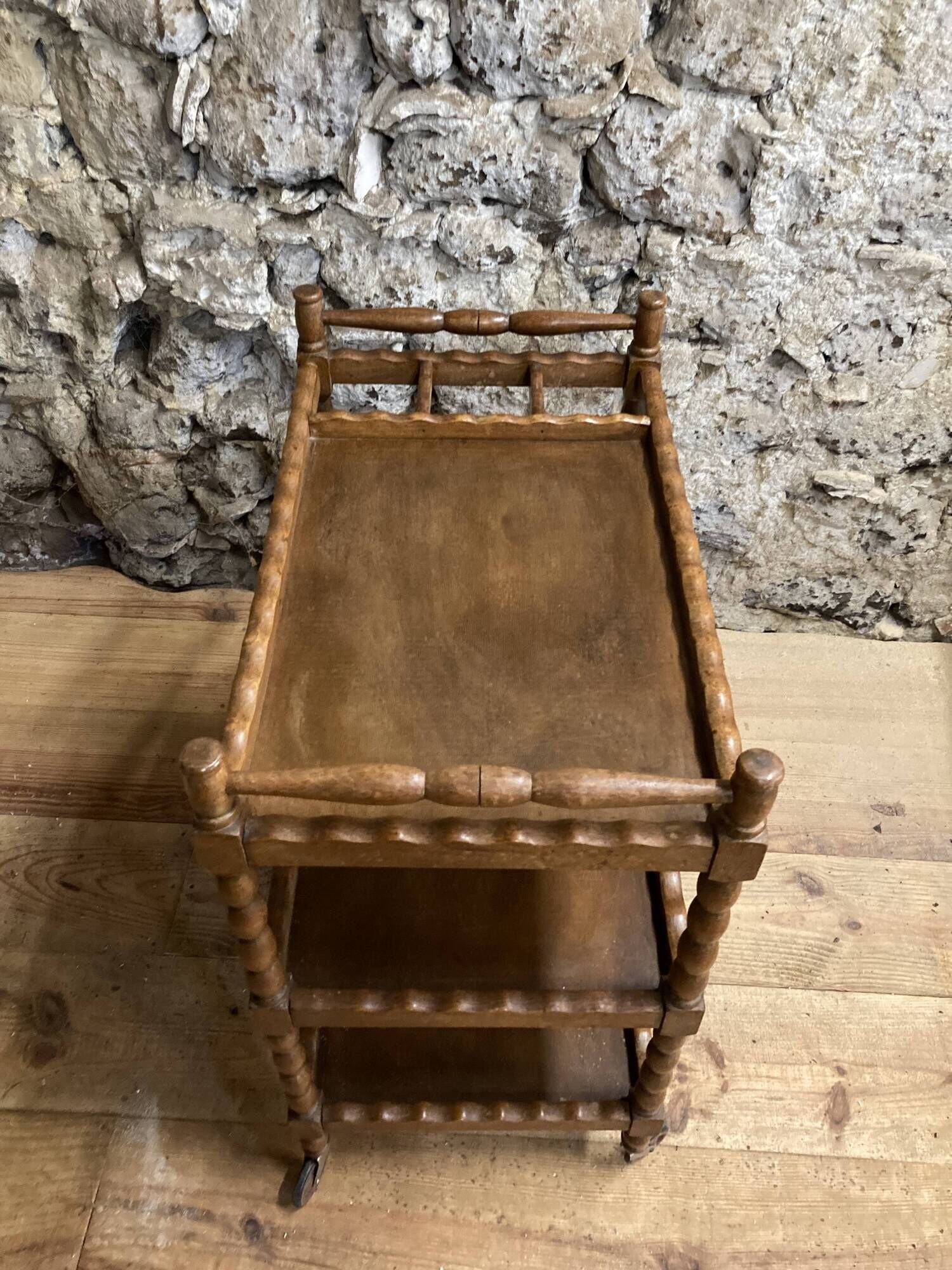Wooden service turned on old wheels with bottle holder