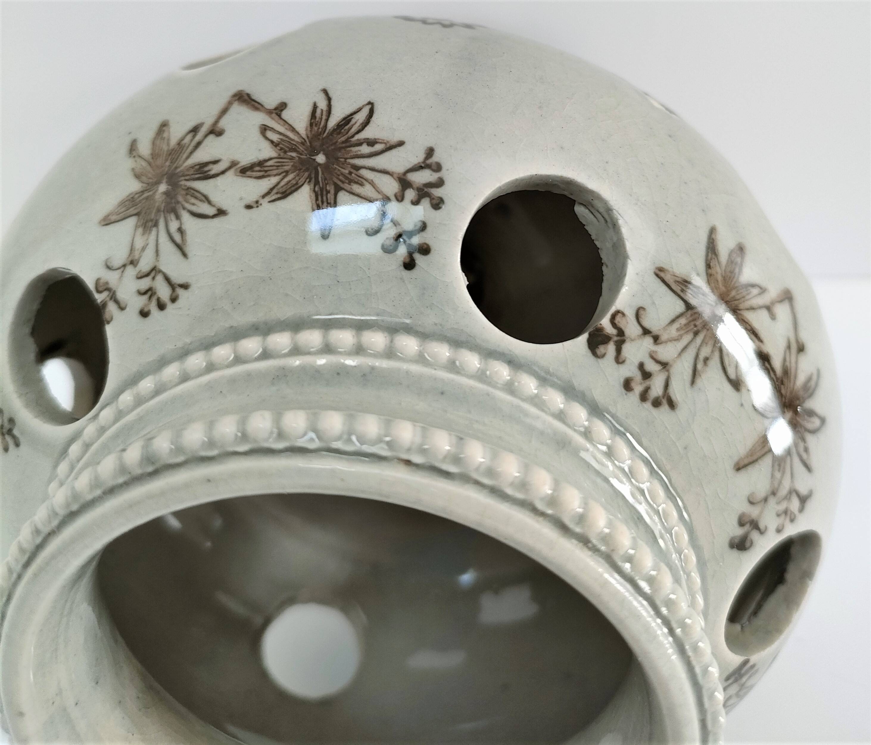 Three Saint-Uze ceramic tealight candle holders, early 20th century