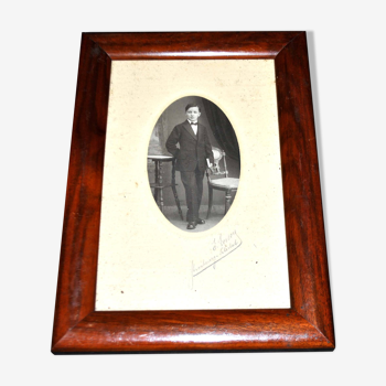 Old mahogany wood photo frame and Gentelman man photo