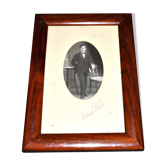 Old mahogany wood photo frame and Gentelman man photo