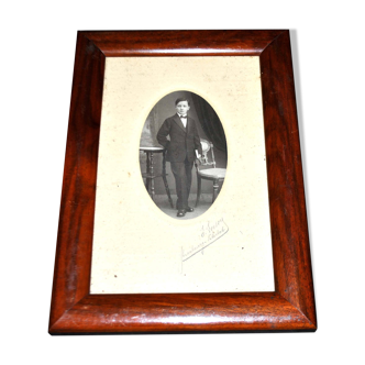 Old mahogany wood photo frame and Gentelman man photo